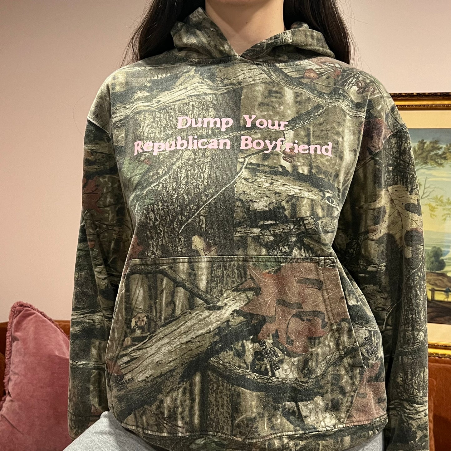 DUMP YOUR REPUBLICAN BOYFRIEND camo hoodie with pink text (M)